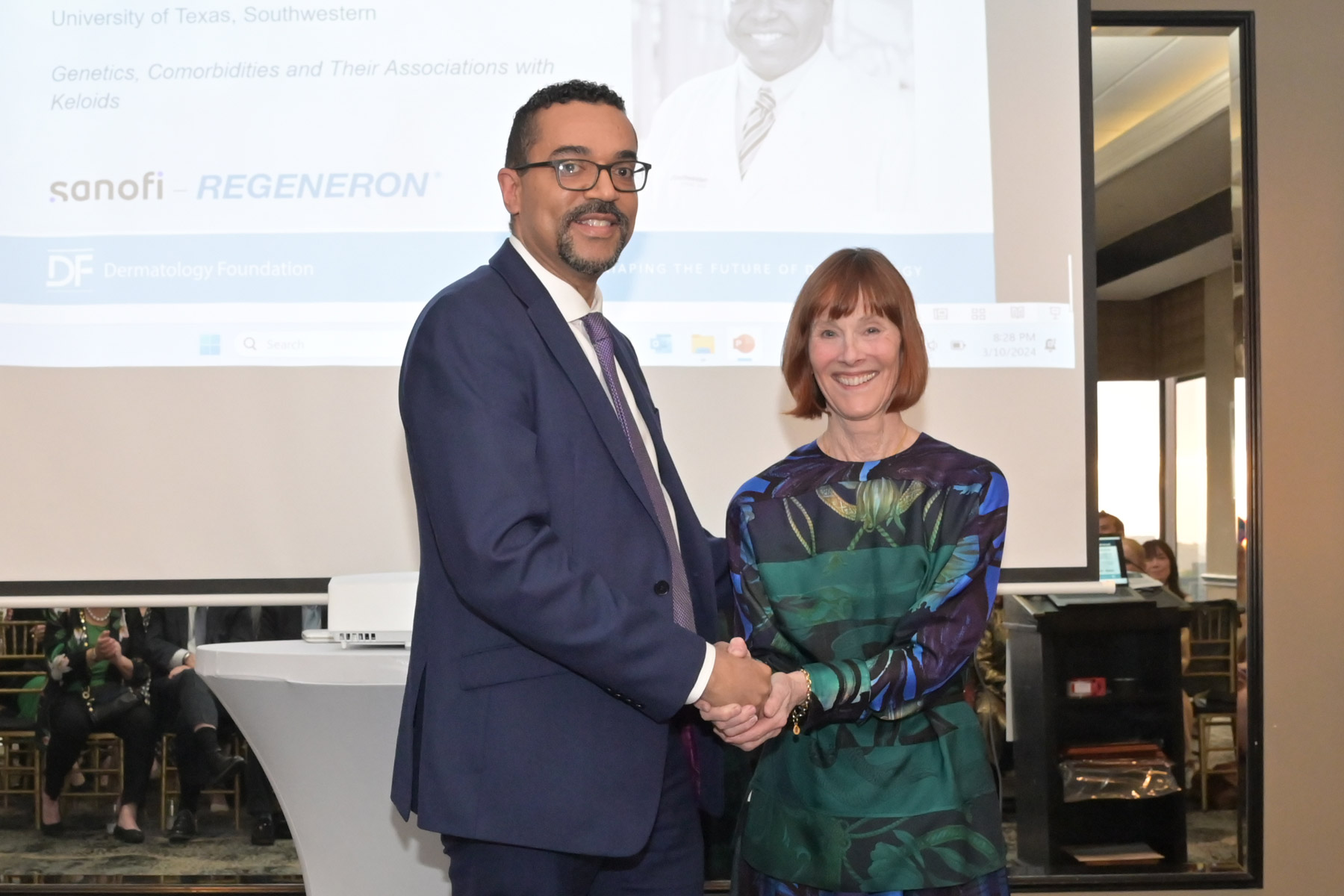 Donald Glass II, MD, PhD, was honored as the first recipient of the new DF Sanofi and Regeneron Diversity, Equity, and Inclusion Mid-Career Award for his research, "Genetics, Comorbidities and their Association with Keloids." SOCS representative Dr. Andrew Alexis accepted the award on his behalf.