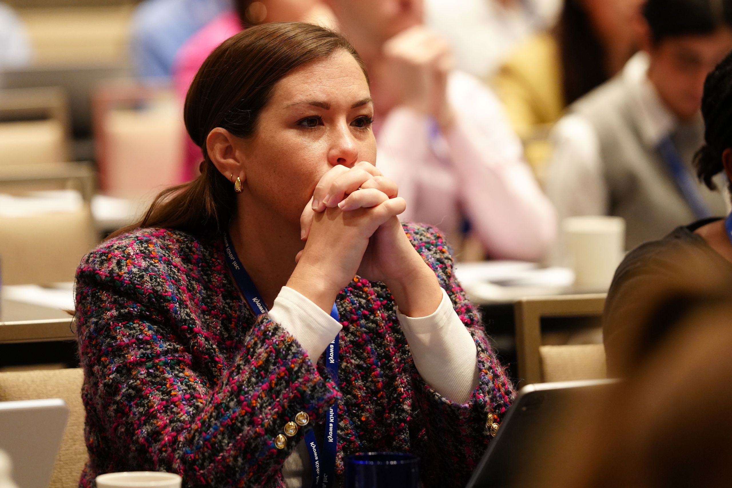 778388599-photo-1_hero-image_cs_fall Photo of a woman with her hands clasped under her chin